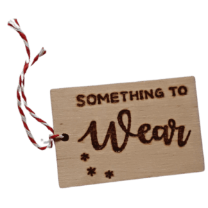 Luxury hand burnt wooden christmas gift tags saying 'something to wear'