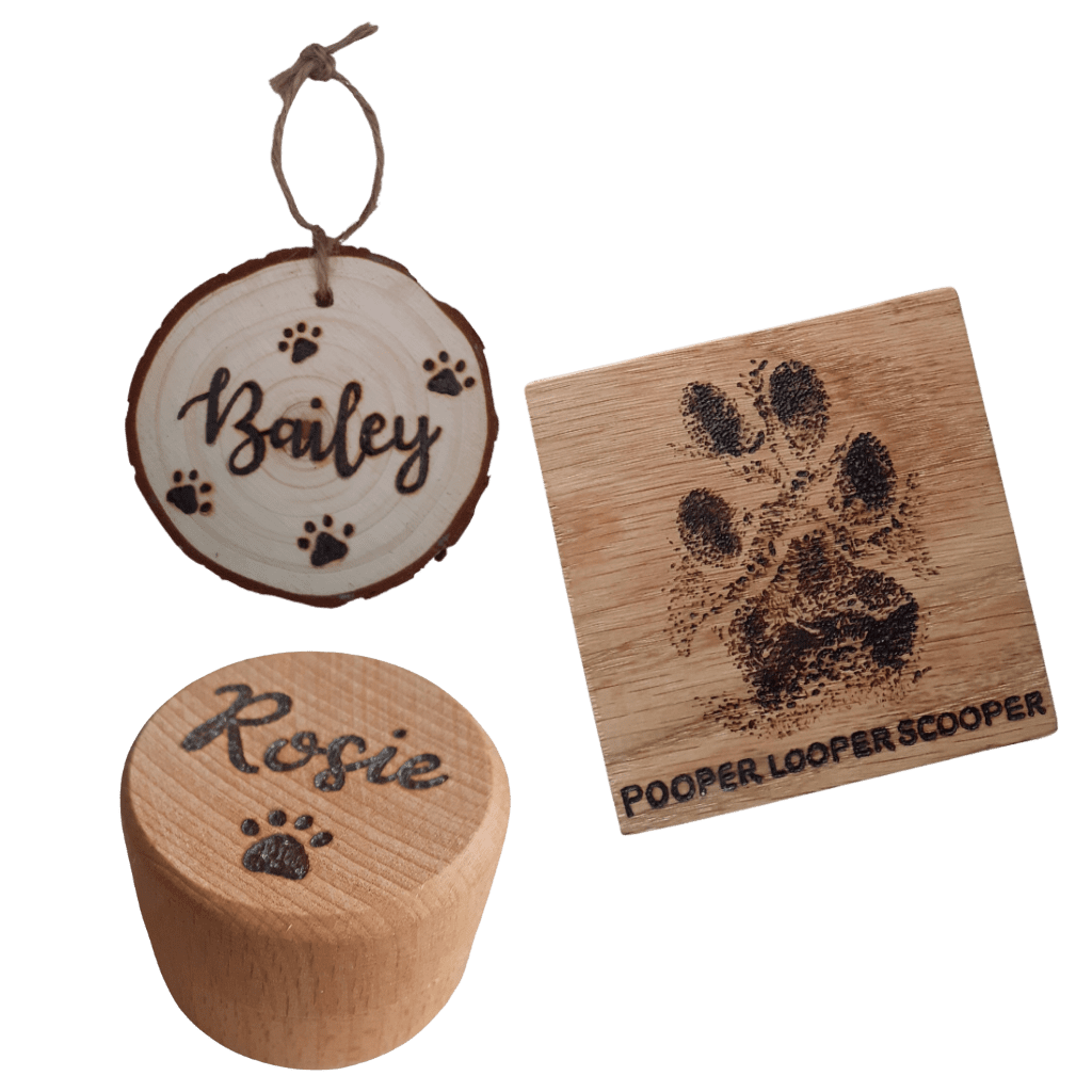 A selection of pet gifts including a memorial coaster, personalised rustic hanging wood slice and personalised memorial pot