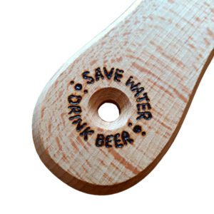 end of bottle opener which reads 'save water drink beer'