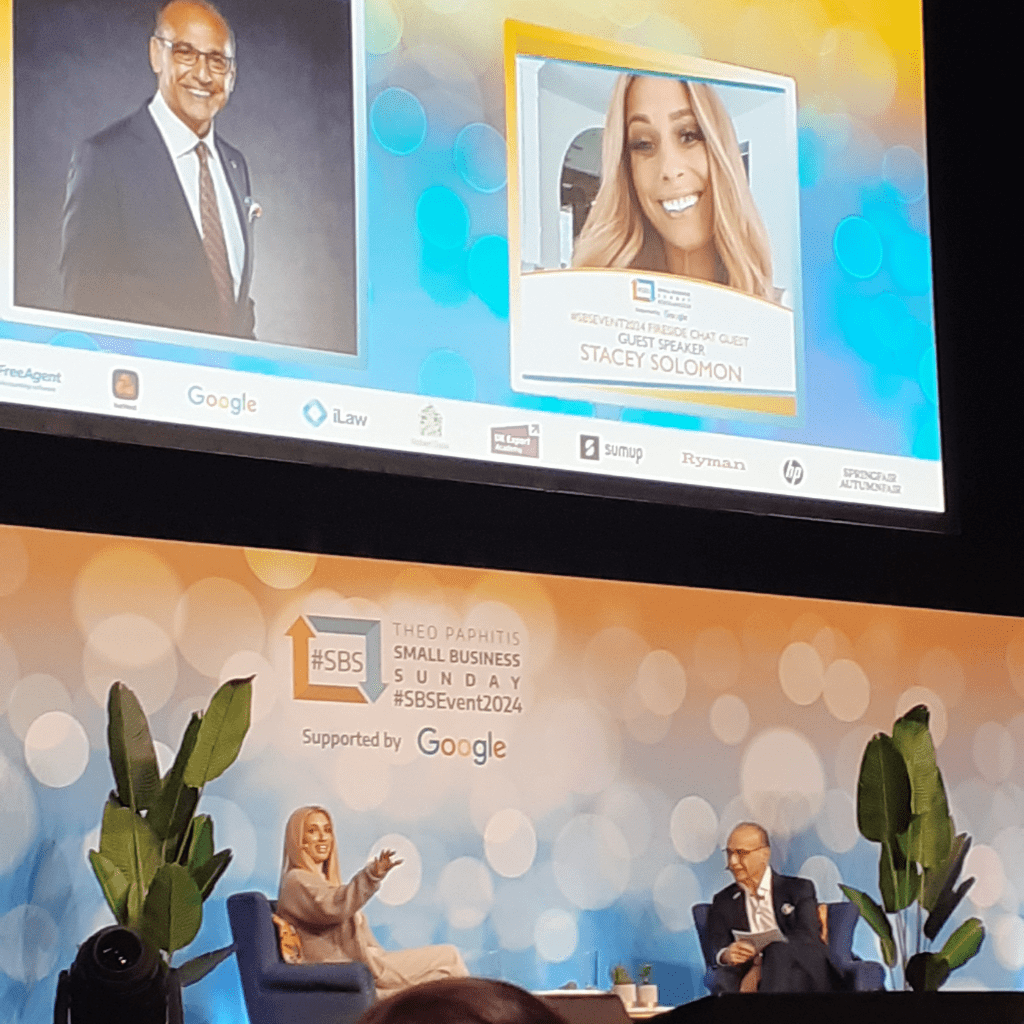 A photo showing Theo Paphitis and Stacey Solomon on stage at #sbsevent2024