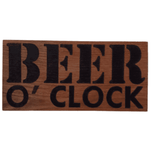 oak wood sign with hand burnt text saying 'beer o'clock'