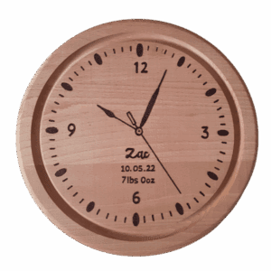 A hand burnt personalised wooden clock for a babies room. Hand burnt with babies name, date of birth, weight and time showing time of birth