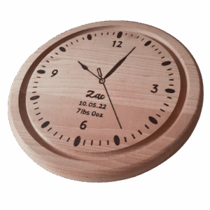 A hand burnt personalised wooden clock for a babies room. Hand burnt with babies name, date of birth, weight and time showing time of birth