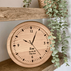 A hand burnt personalised wooden clock for a babies room. Hand burnt with babies name, date of birth, weight and time showing time of birth