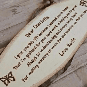 handmade wooden personalised log plaque with hand burnt poem for a nursery worker